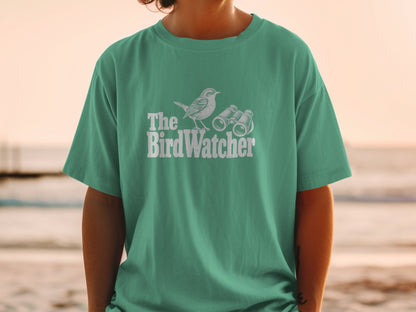 Green t-shirt with "The BirdWatcher" text, bird, and binoculars graphic.