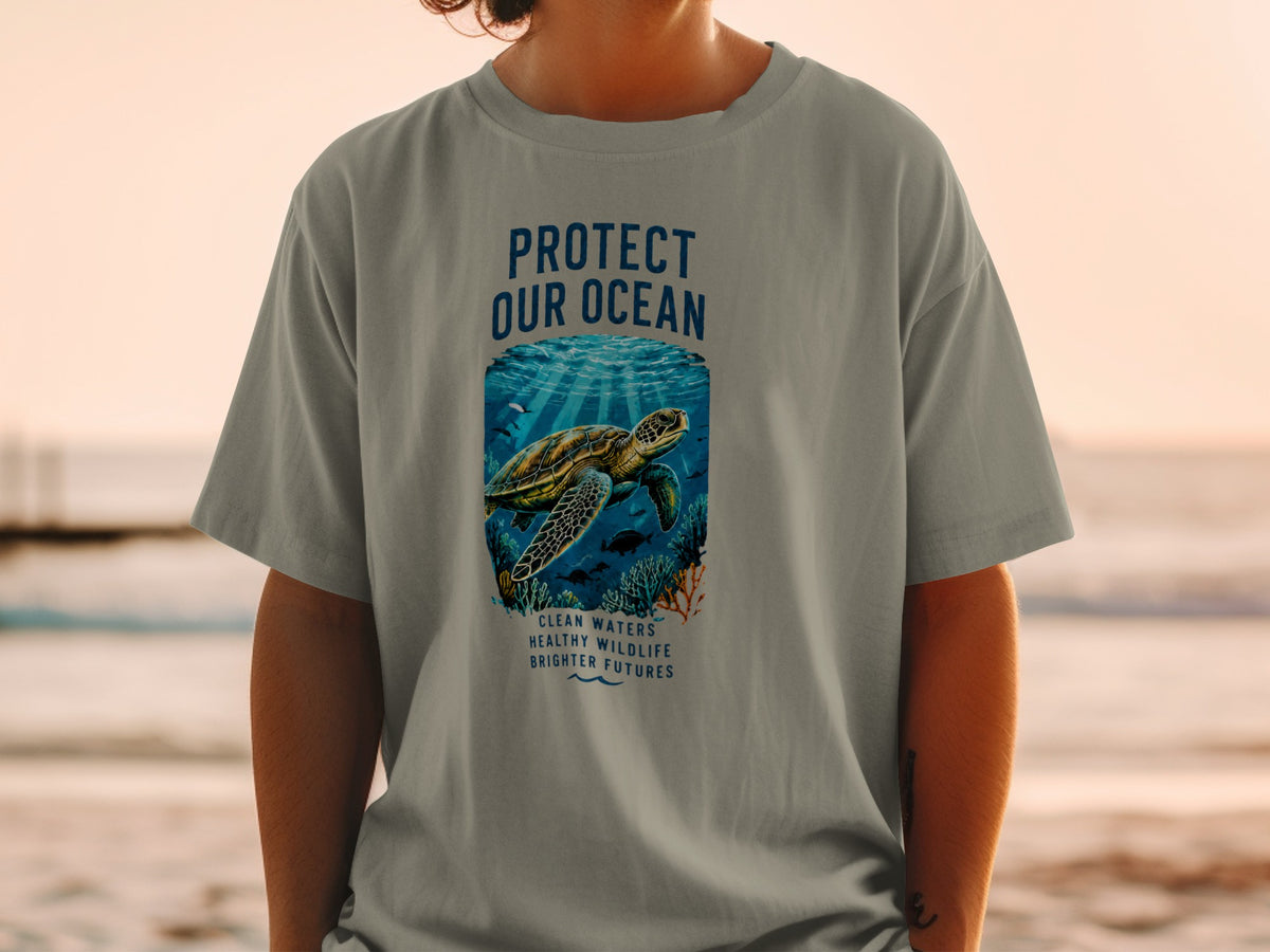 T-shirt with sea turtle graphic and text "Protect Our Ocean, Clean Waters, Healthy Wildlife, Brighter Futures".