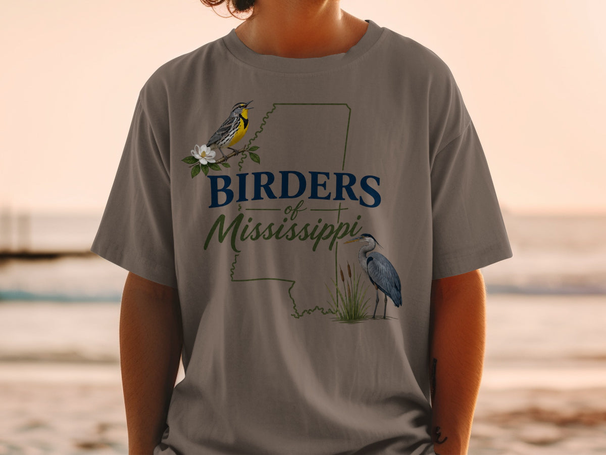 T-shirt with "Birders of Mississippi" text, a yellow bird, and a blue heron.