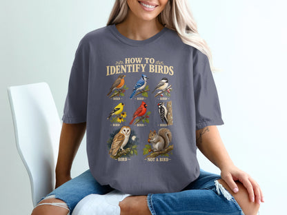 T-shirt with "How to Identify Birds" text and illustrations of various birds and a squirrel.