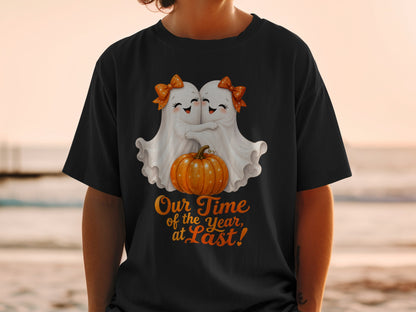 Black t-shirt with two hugging ghosts and "Our Time of the Year, at Last!"