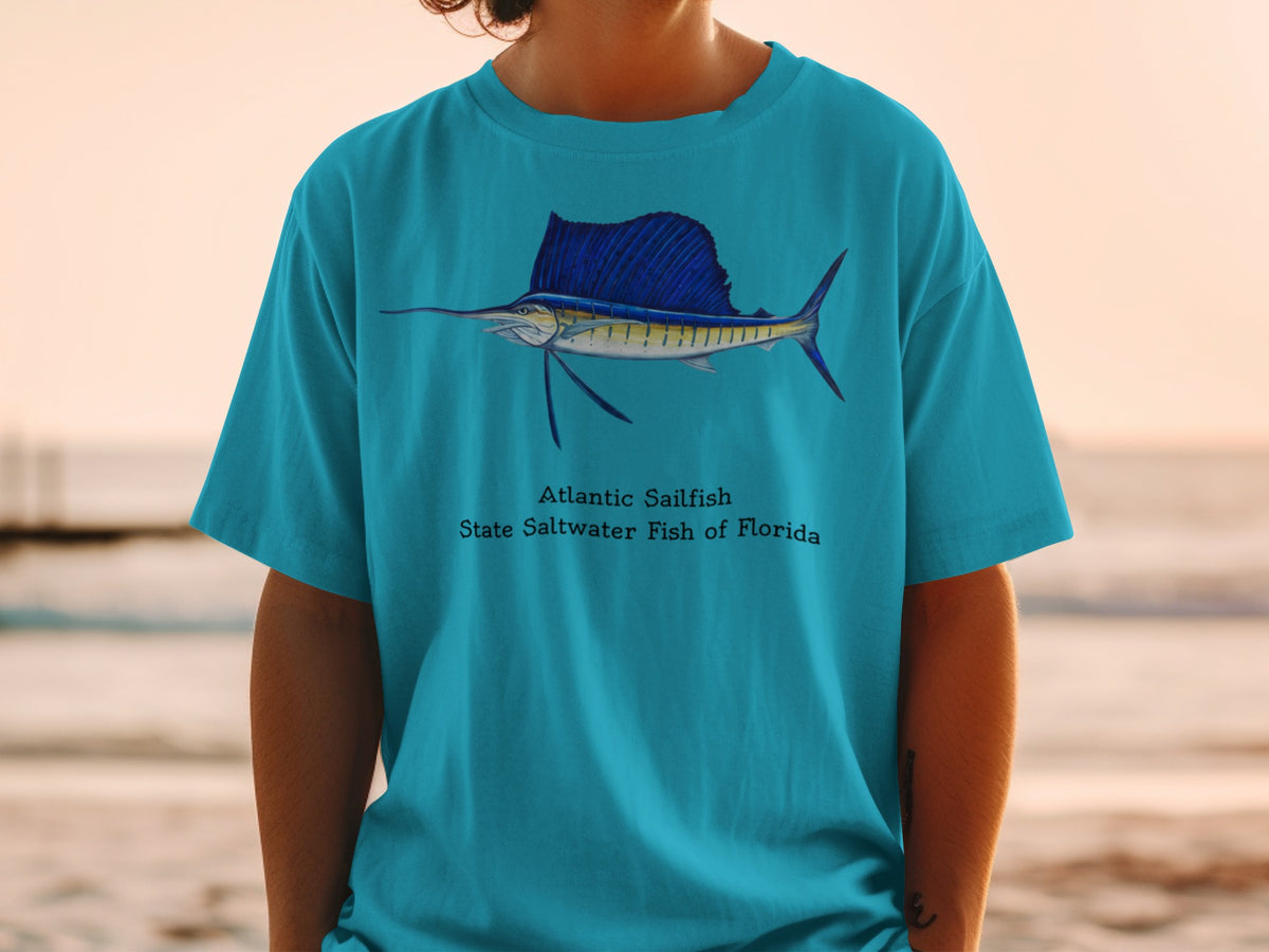 Turquoise t-shirt with Atlantic Sailfish art and "State Saltwater Fish of Florida" text.