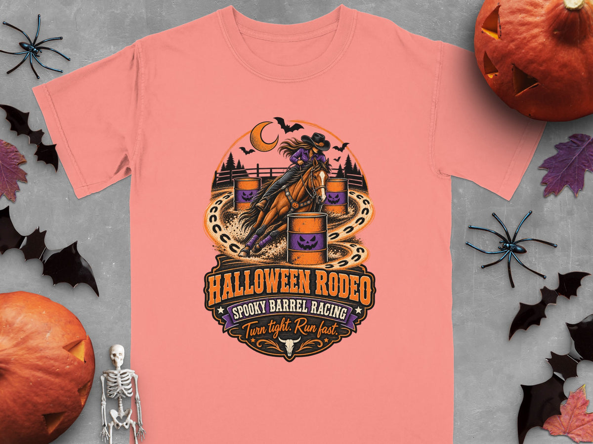 T-shirt graphic of a cowgirl and horse in a Halloween rodeo with text "Halloween Rodeo" and "Spooky Barrel Racing".
