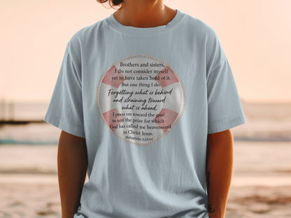 Light blue t-shirt with text from Philippians 3:13-14 within a life preserver graphic.