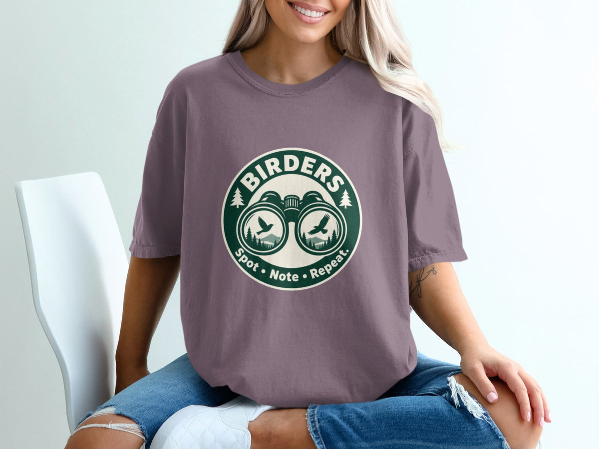 T-shirt with "BIRDERS Spot • Note • Repeat." text and binocular logo.