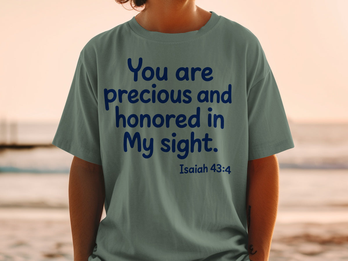 Green t-shirt with blue text: "You are precious and honored in My sight. Isaiah 43:4"