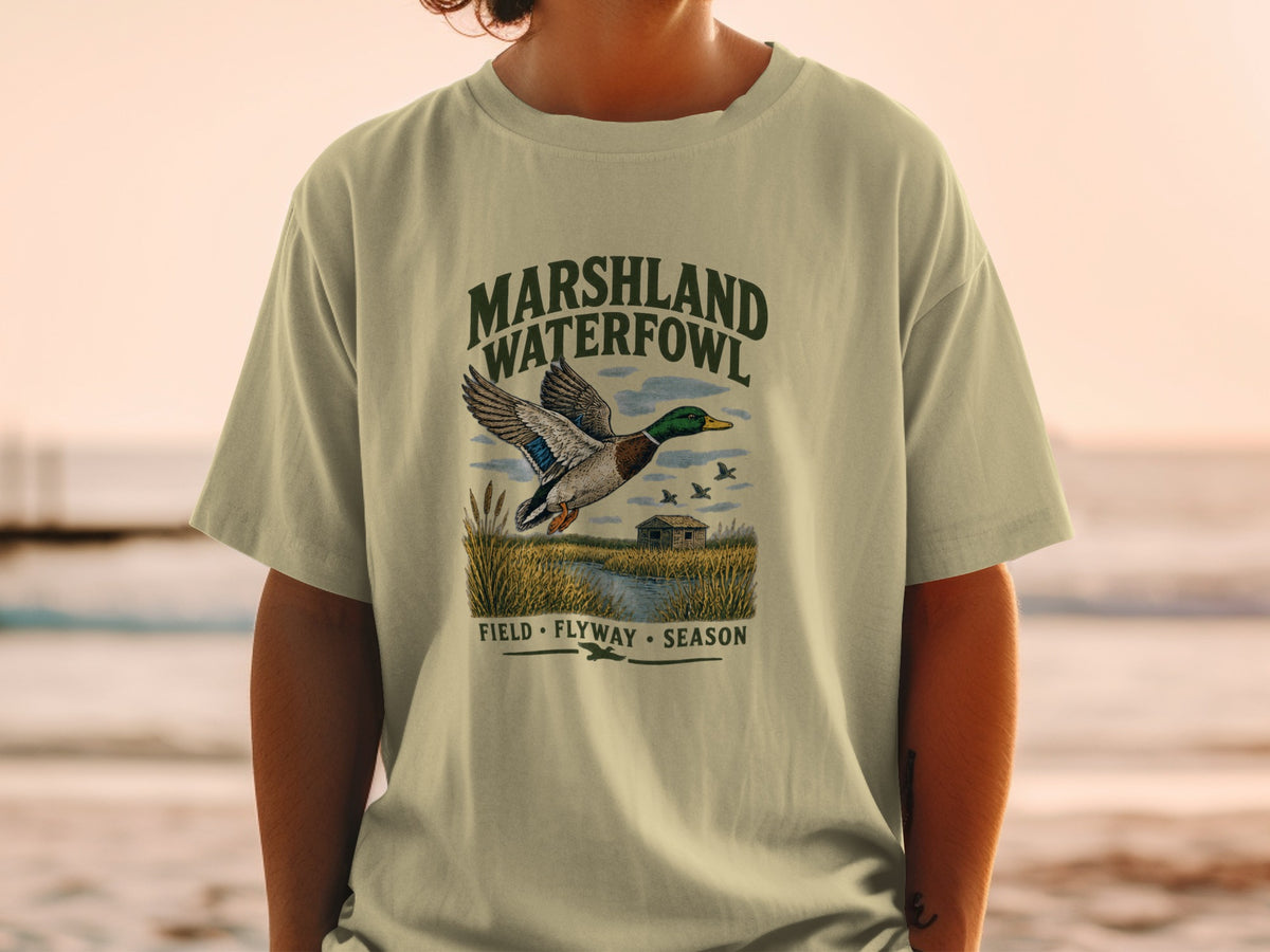 T-shirt with "MARSHLAND WATERFOWL" text and flying duck illustration.