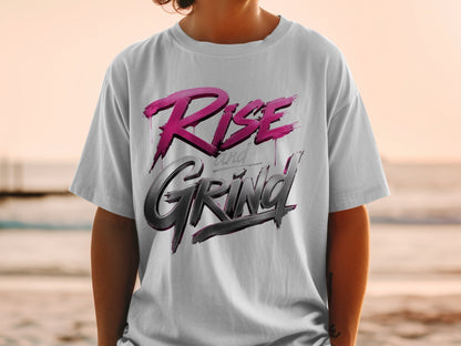 White t-shirt with "Rise and Grind" text in pink and black lettering