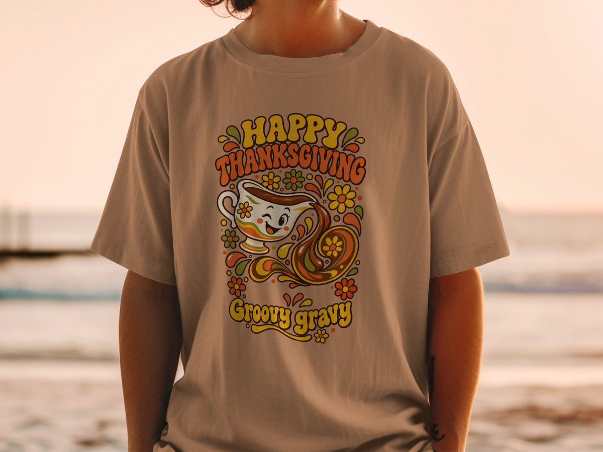 Happy Thanksgiving Groovy Gravy graphic on a brown t-shirt.