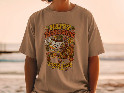 Happy Thanksgiving Groovy Gravy graphic on a brown t-shirt.