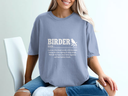 Light blue t-shirt with white text and bird graphic describing "BIRDER".