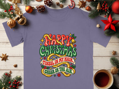Purple t-shirt with text "Happy Christmas, Tinsel in My Hair, Cheer in the Air."