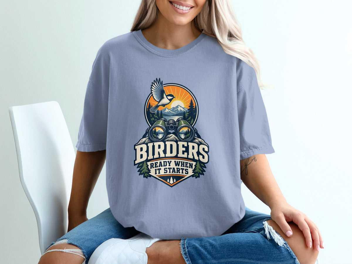Birders Ready When It Starts graphic with binoculars, bird, mountains, and sun.