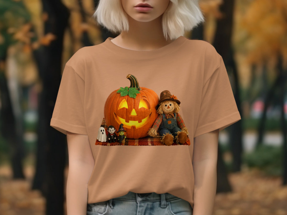 T-shirt with Halloween graphic: jack-o'-lantern, scarecrow, ghosts, and witch.