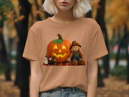 T-shirt with Halloween graphic: jack-o'-lantern, scarecrow, ghosts, and witch.