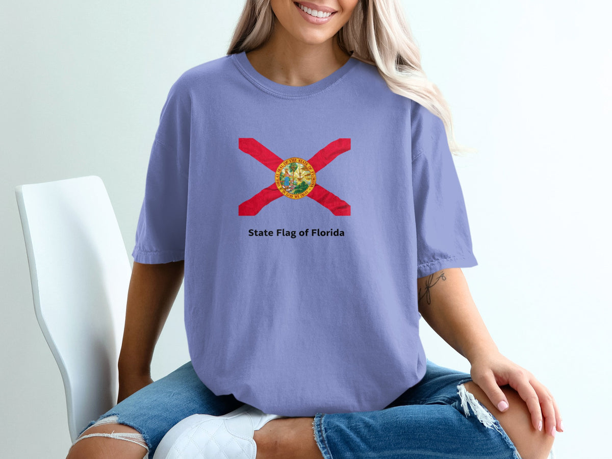 Purple t-shirt featuring the Florida state flag and text "State Flag of Florida."
