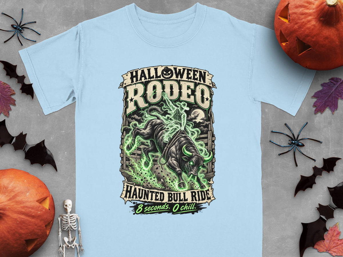 Light blue t-shirt with "Halloween Rodeo Haunted Bull Ride" graphic.