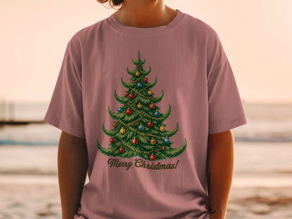 Pink t-shirt with a decorated Christmas tree and "Merry Christmas!" text.