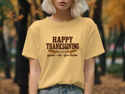 Yellow t-shirt with "Happy Thanksgiving" and "gather eat give thanks" text.