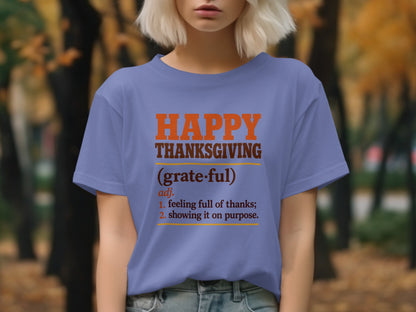 Purple t-shirt with "Happy Thanksgiving" and its dictionary definition.