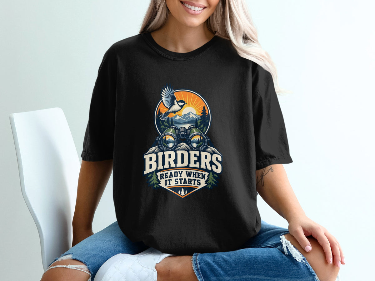 Black t-shirt with "BIRDERS READY WHEN IT STARTS" graphic featuring binoculars and a bird.