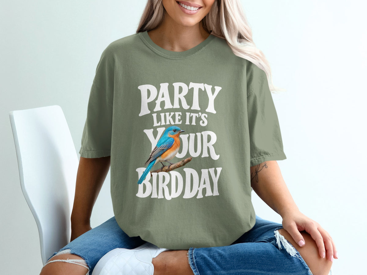 Green t-shirt with text "Party Like It's Your Bird Day" and a blue bird.