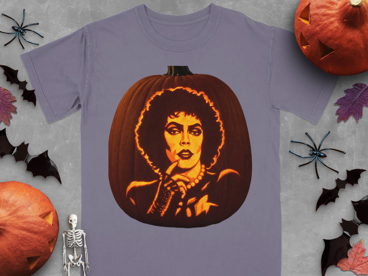 A gray t-shirt features a carved pumpkin graphic of Frank-N-Furter, surrounded by Halloween props.