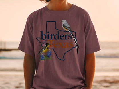 Maroon t-shirt with "birders of Texas" text and two bird illustrations.
