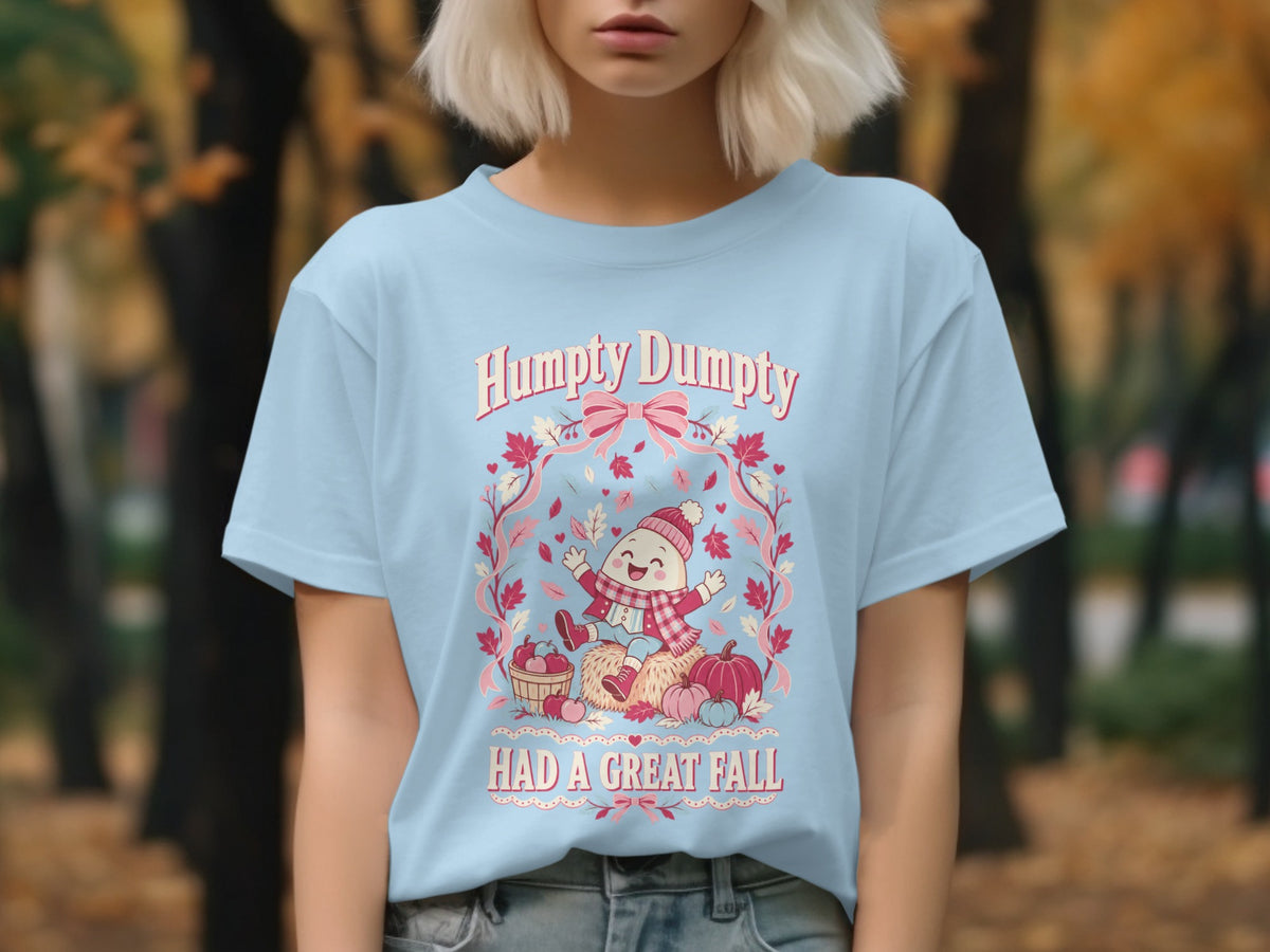 Light blue t-shirt with "Humpty Dumpty HAD A GREAT FALL" and autumn graphics.