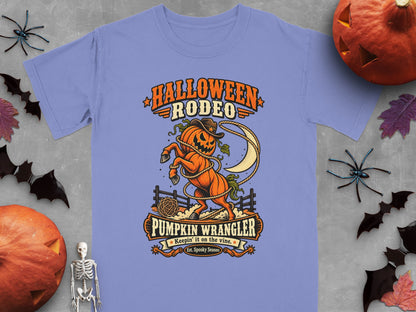 Halloween Rodeo Pumpkin Wrangler graphic with a pumpkin horse and moon.