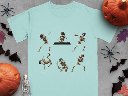 Light blue t-shirt with six dancing skeletons and Halloween decorations.