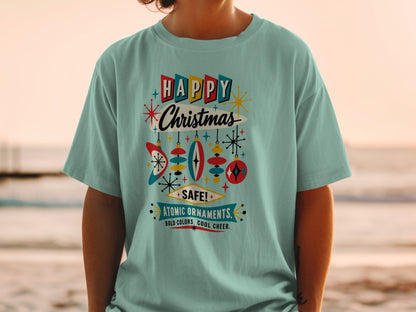 Light blue t-shirt with "Happy Christmas" in retro style, atomic ornaments, and "Safe!" text.