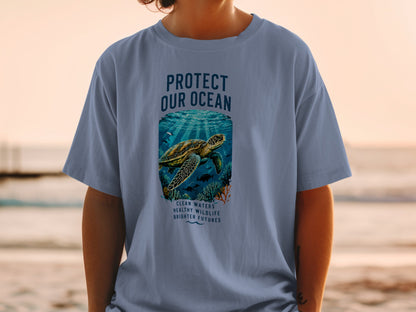 T-shirt with text "Protect Our Ocean" and sea turtle graphic.