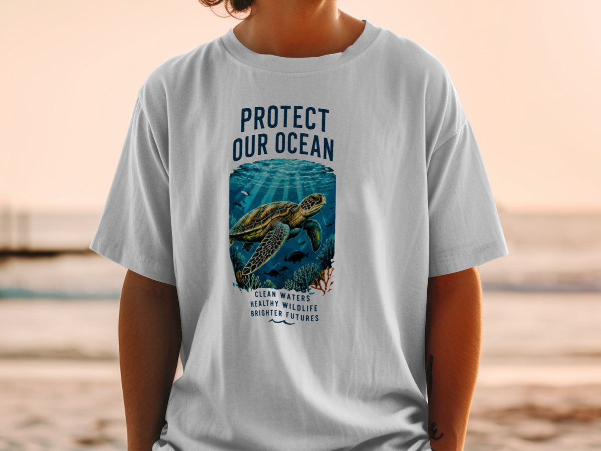 White t-shirt with "Protect Our Ocean" text and sea turtle graphic.