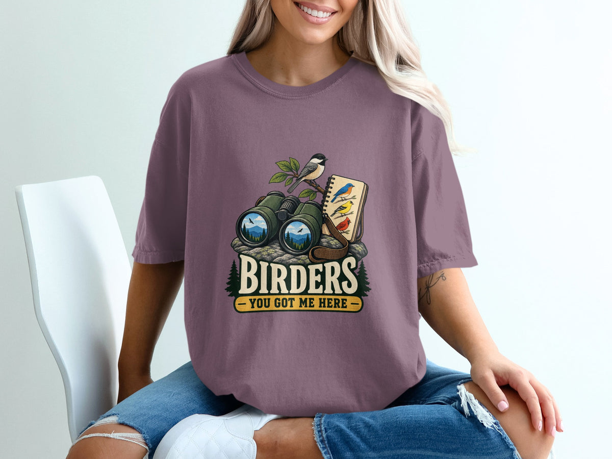Binoculars, notebook, and birds illustration with text "BIRDERS YOU GOT ME HERE".