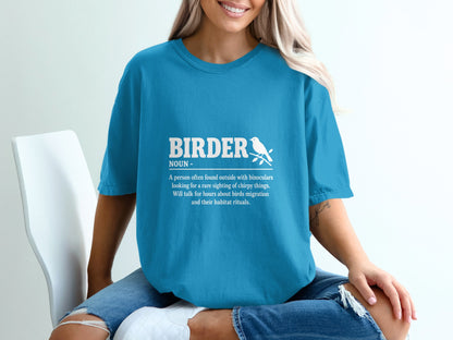 Blue t-shirt with white text defining "Birder" and a small bird on a branch.