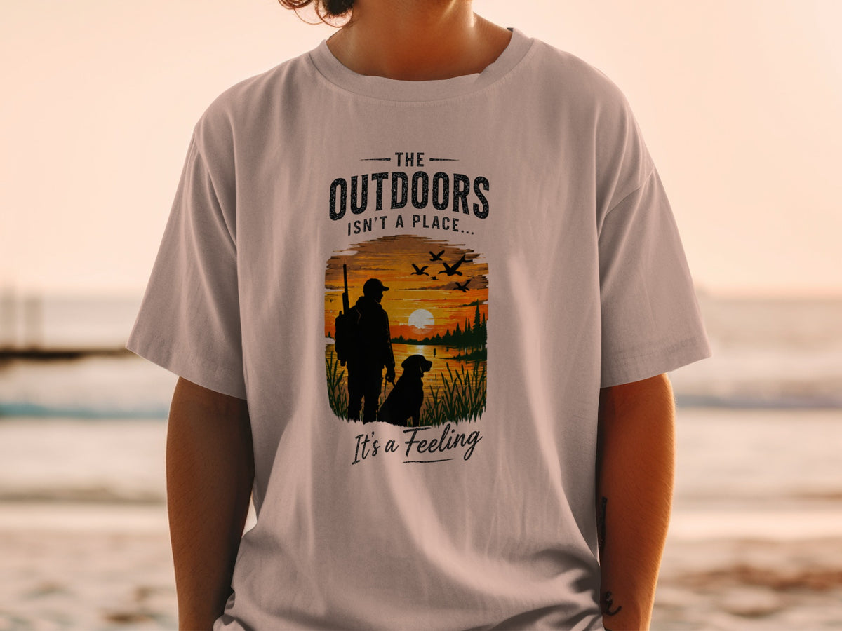 T-shirt with "The Outdoors Isn't a Place It's a Feeling" and hunting graphic.