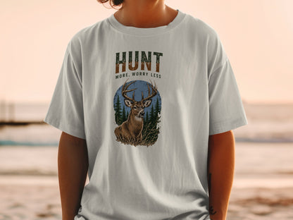 T-shirt with a deer graphic and the text "HUNT MORE, WORRY LESS".