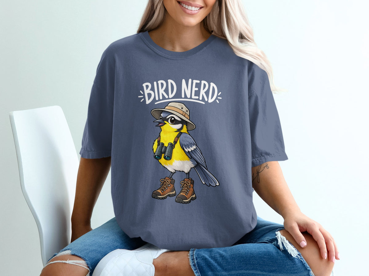 T-shirt graphic with text "BIRD NERD" and a cartoon blue tit with binoculars and boots.