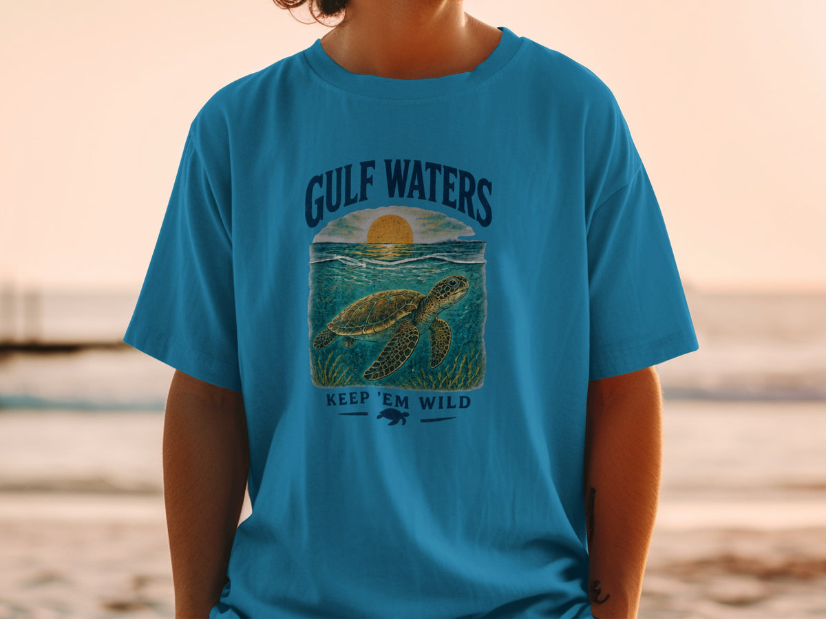 Teal t-shirt with "GULF WATERS" and a sea turtle graphic saying "KEEP 'EM WILD."