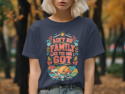 Navy t-shirt with "Ain't No Family Like The One I Got" text and Thanksgiving food illustration.