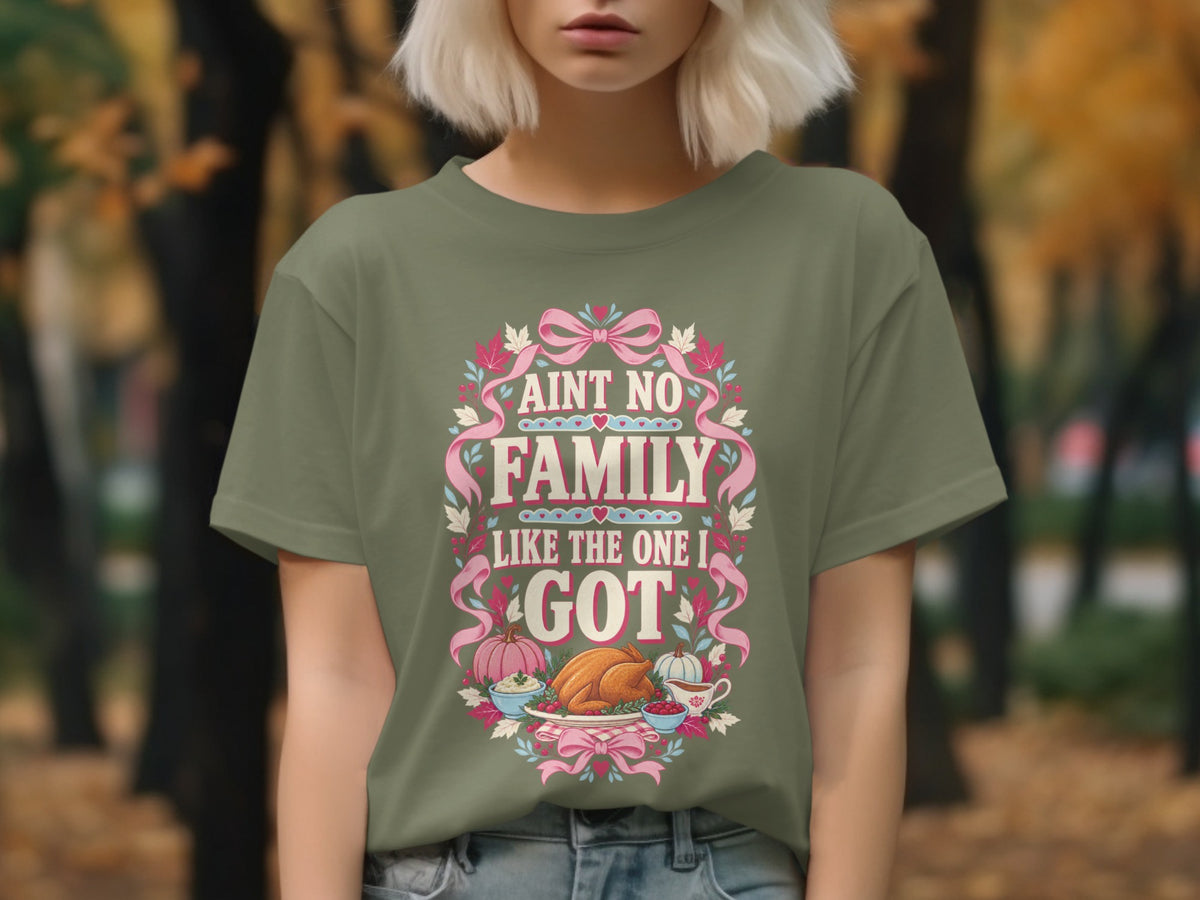 Olive green t-shirt with "Aint No Family Like The One I Got" and Thanksgiving food graphic.