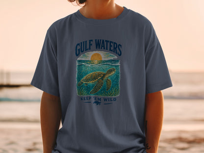 T-shirt with Gulf Waters turtle graphic and "KEEP 'EM WILD" text.