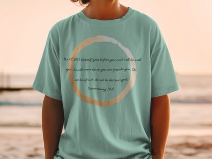 Teal t-shirt with text: "The LORD himself goes before you... Deuteronomy 31:8"