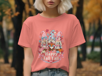 Three gnomes with pumpkins and text "Happy Fall Y'all" on a pink t-shirt.