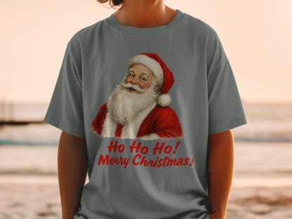 Santa Claus illustration with "Ho Ho Ho! Merry Christmas!" text on a grey t-shirt.