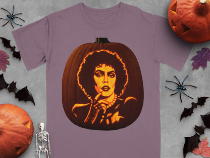 Mauve t-shirt featuring a lit jack-o-lantern carved with the face of Dr. Frank-N-Furter, surrounded by Halloween props.