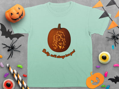 Mint t-shirt with carved pumpkin graphic and text "Dolly, we'll always love you!".