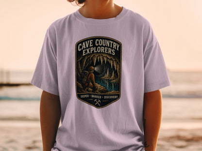 Cave Country Explorers graphic on a light purple t-shirt with cave imagery and text.