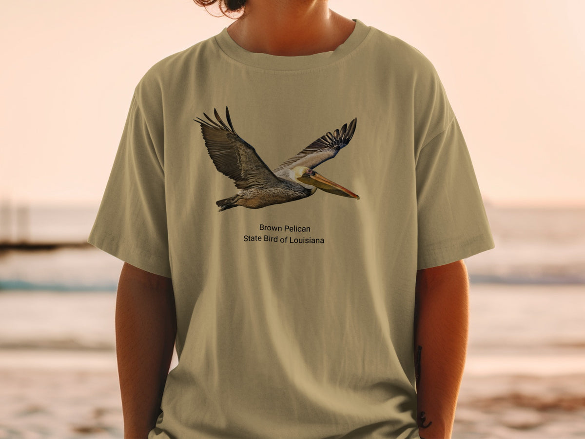 Brown Pelican, State Bird of Louisiana, on a tan t-shirt.